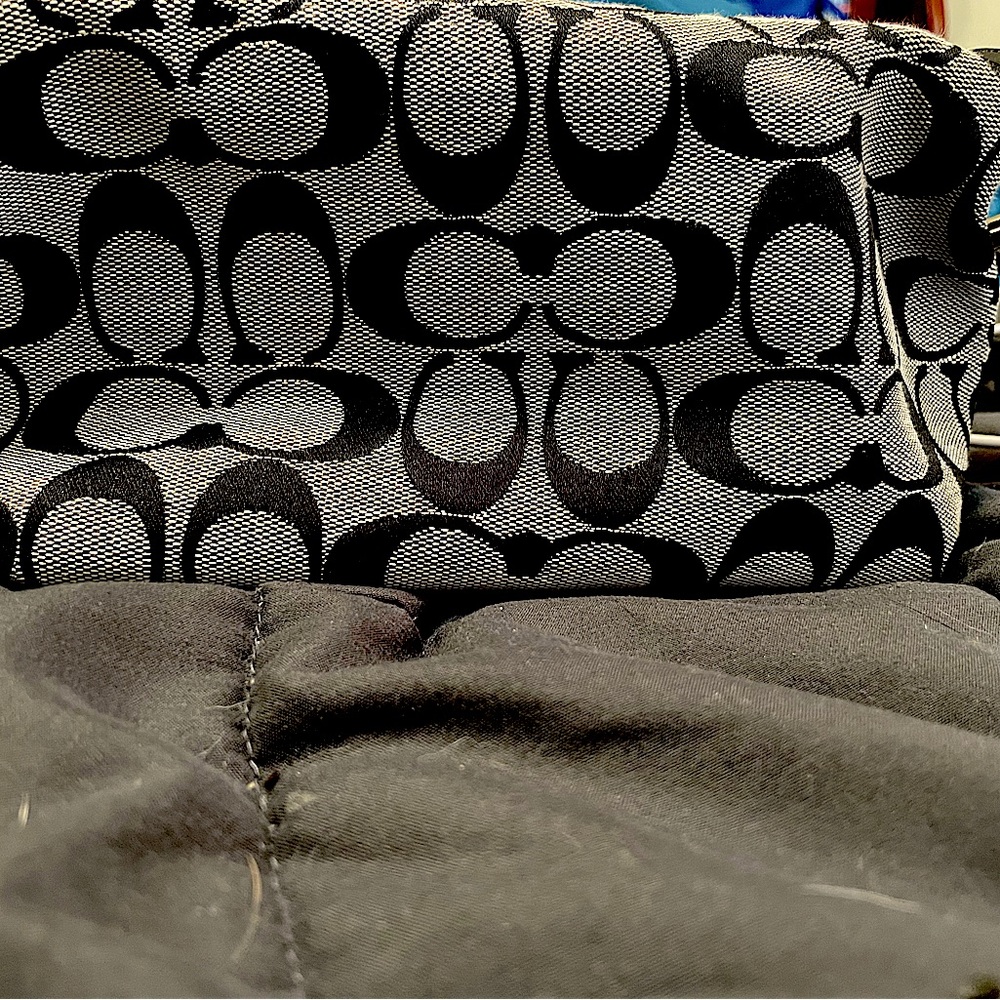 Grey and black coach small hand bag.